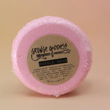 The Chill Pill Bubble Bath Bombs on a peach colored background.