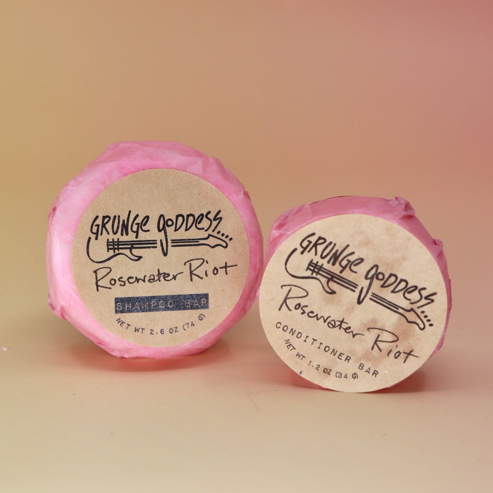 The Rosewater Riot - Shampoo Bar and conditioner bar on a peach-colored background.