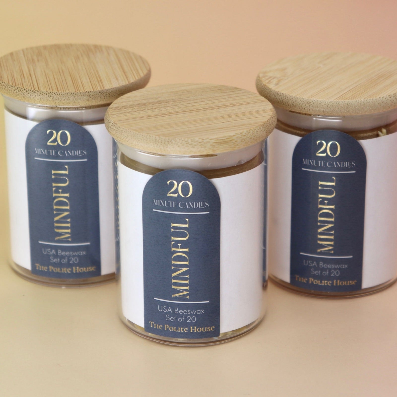 The 20 Minute Beeswax Candle Set: Mindful (Set of 20) on a light pink background.