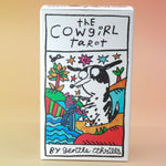 The Cowgirl Tarot Deck on a pink and yellow background.