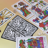 The cards from the Cowgirl Tarot Deck on a pink and yellow background.