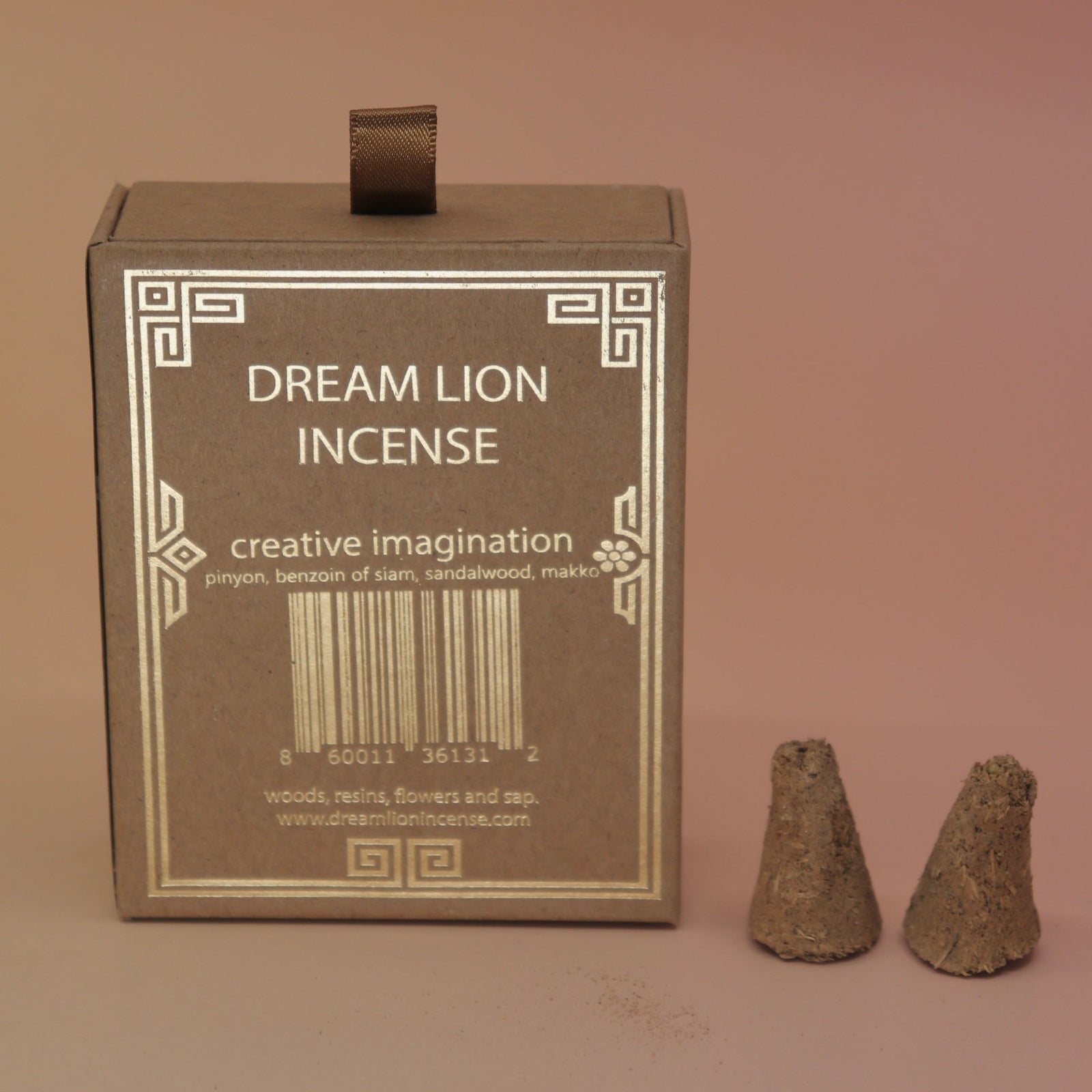 The back of the Creative Imagination Incense Cones box with two incense cones next to it, all on a pink and yellow background.