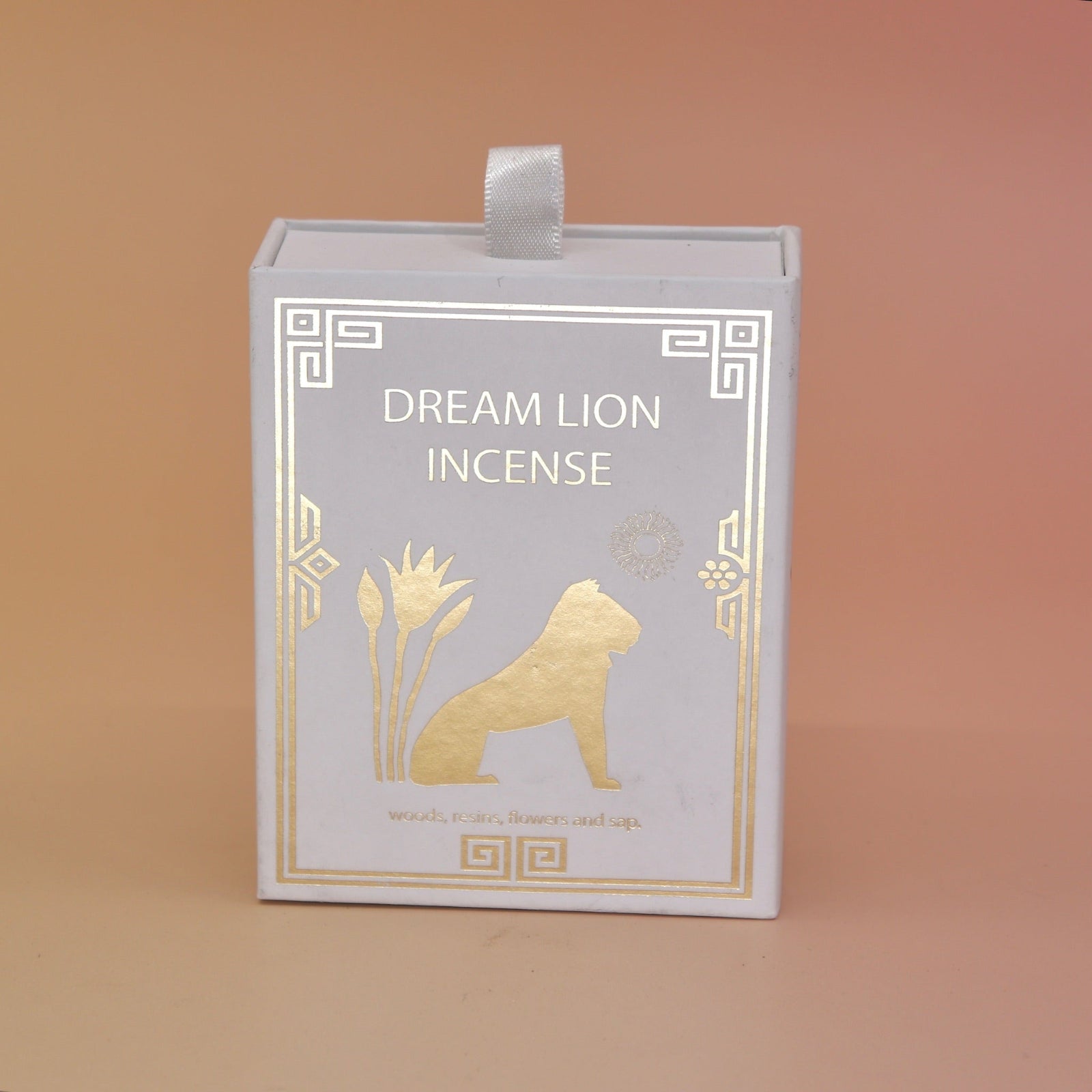 The Nine Treasures Incense Cones box on a pink and yellow background.