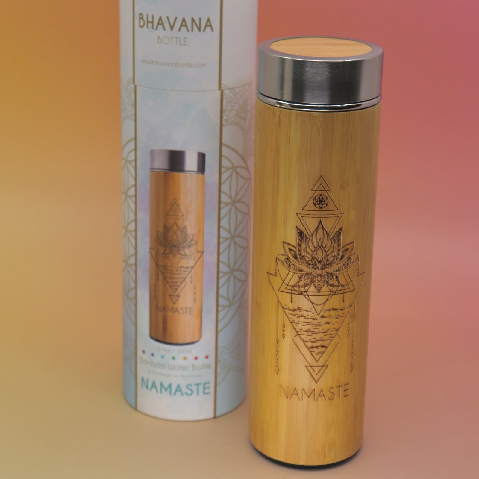 The Namaste Bhavana Bamboo Infuser Traveler Tumbler on a pink and yellow background.