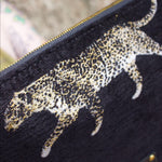An up close image of the Black Velvet Leopard Traveller Large Pouch.