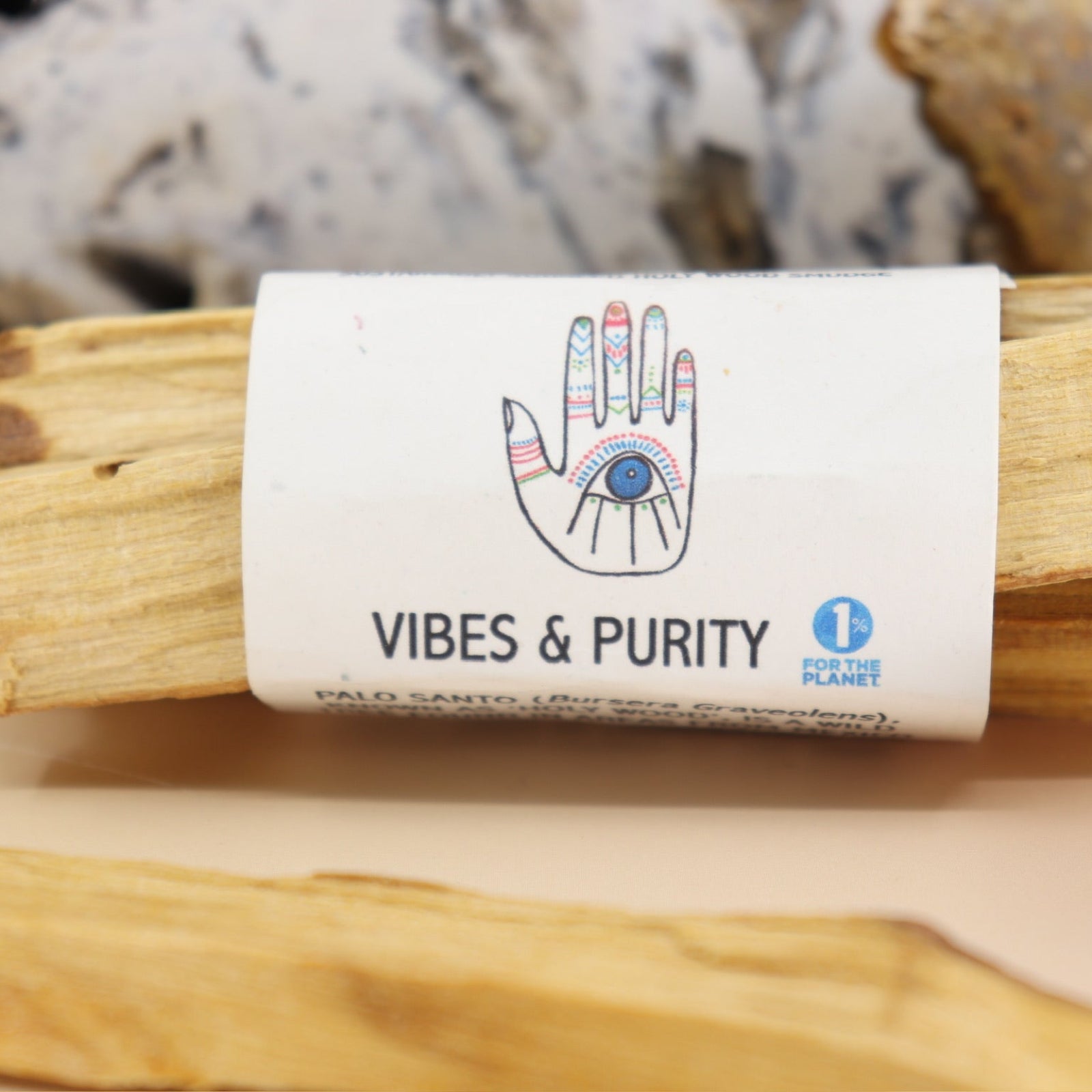 An up close image of the Palo Santo Smudge Bundle by Bohemian Rêves.