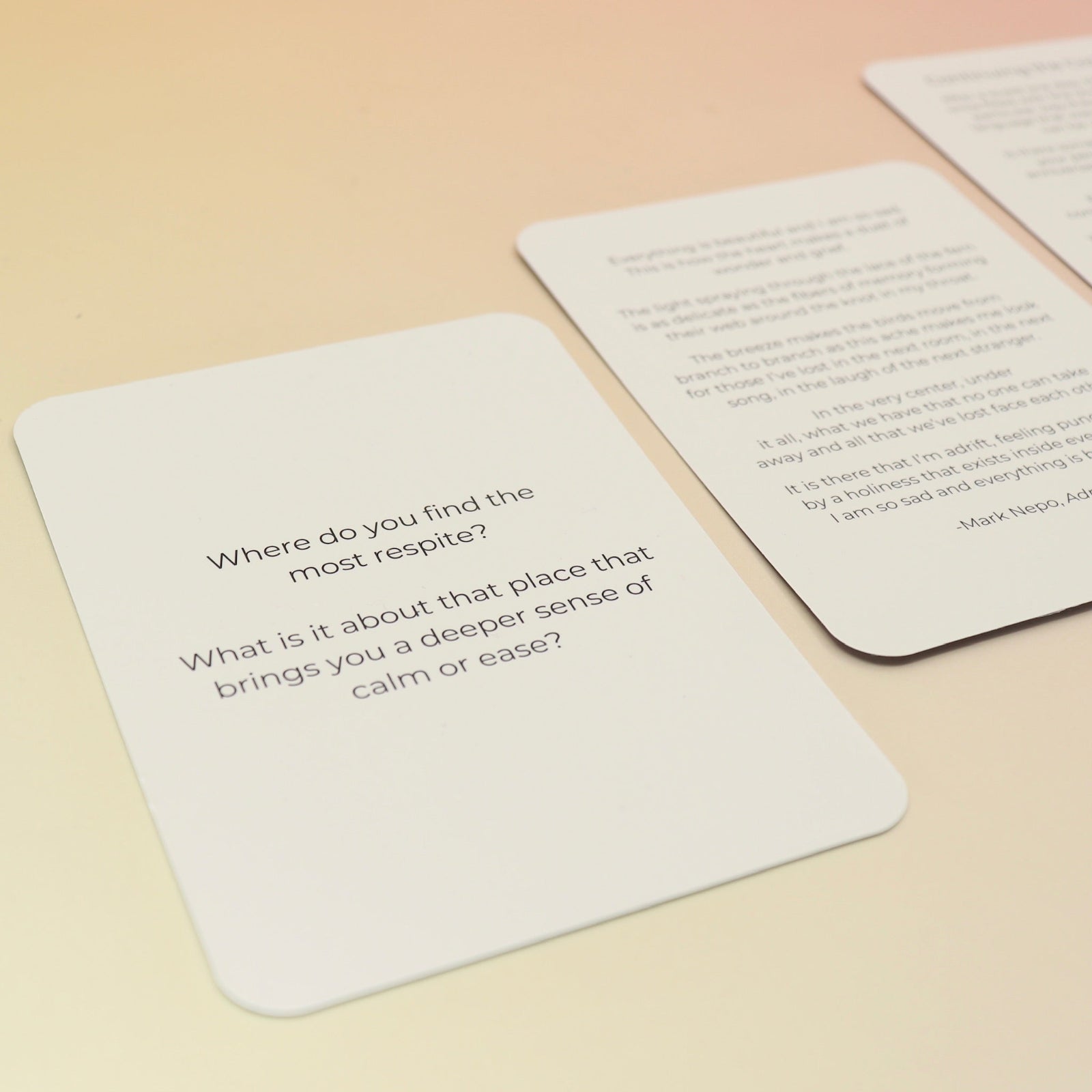 The contents of the Planet Grief Card Deck Bereavement Resource on a pink and yellow background.