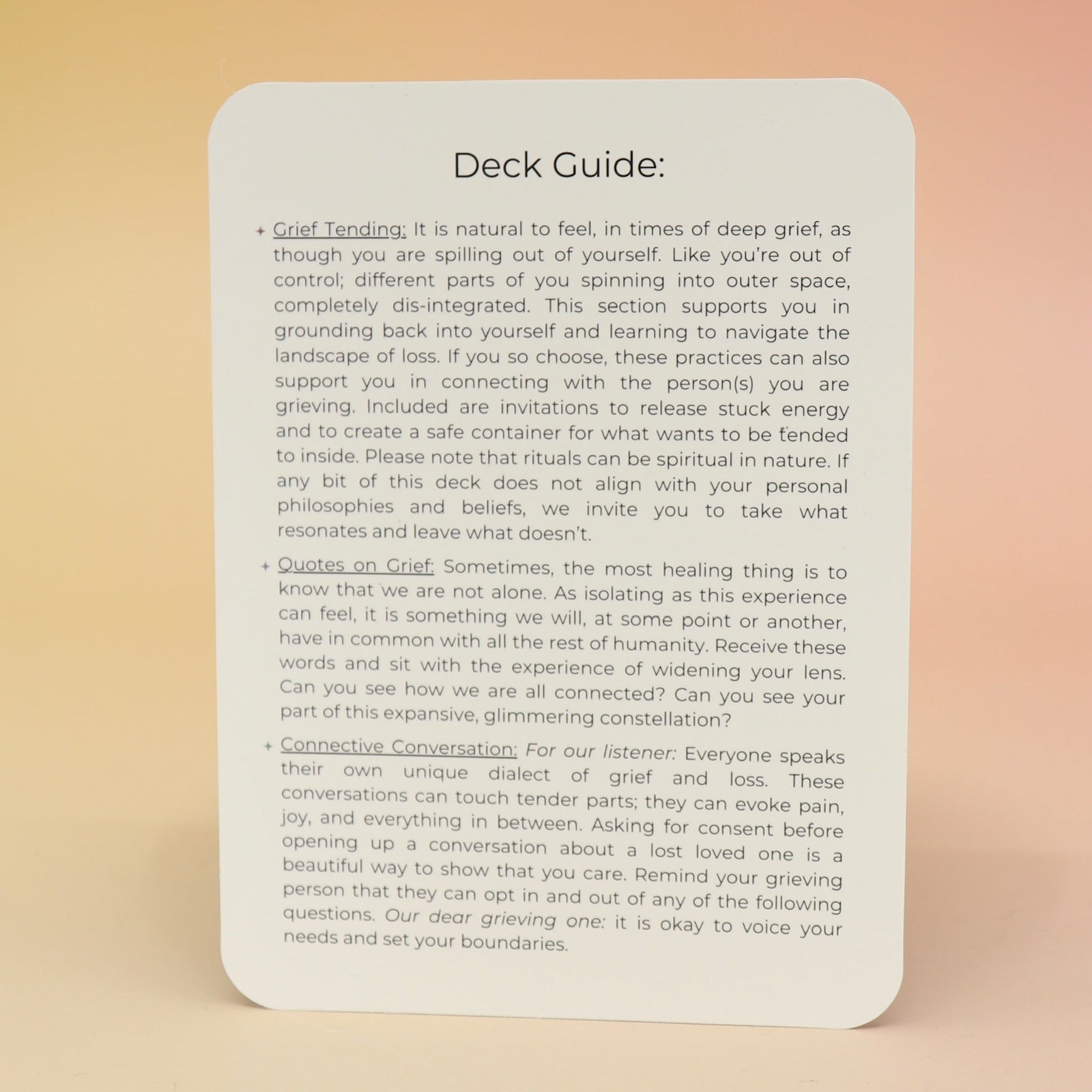 The contents of the Planet Grief Card Deck Bereavement Resource on a pink and yellow background.