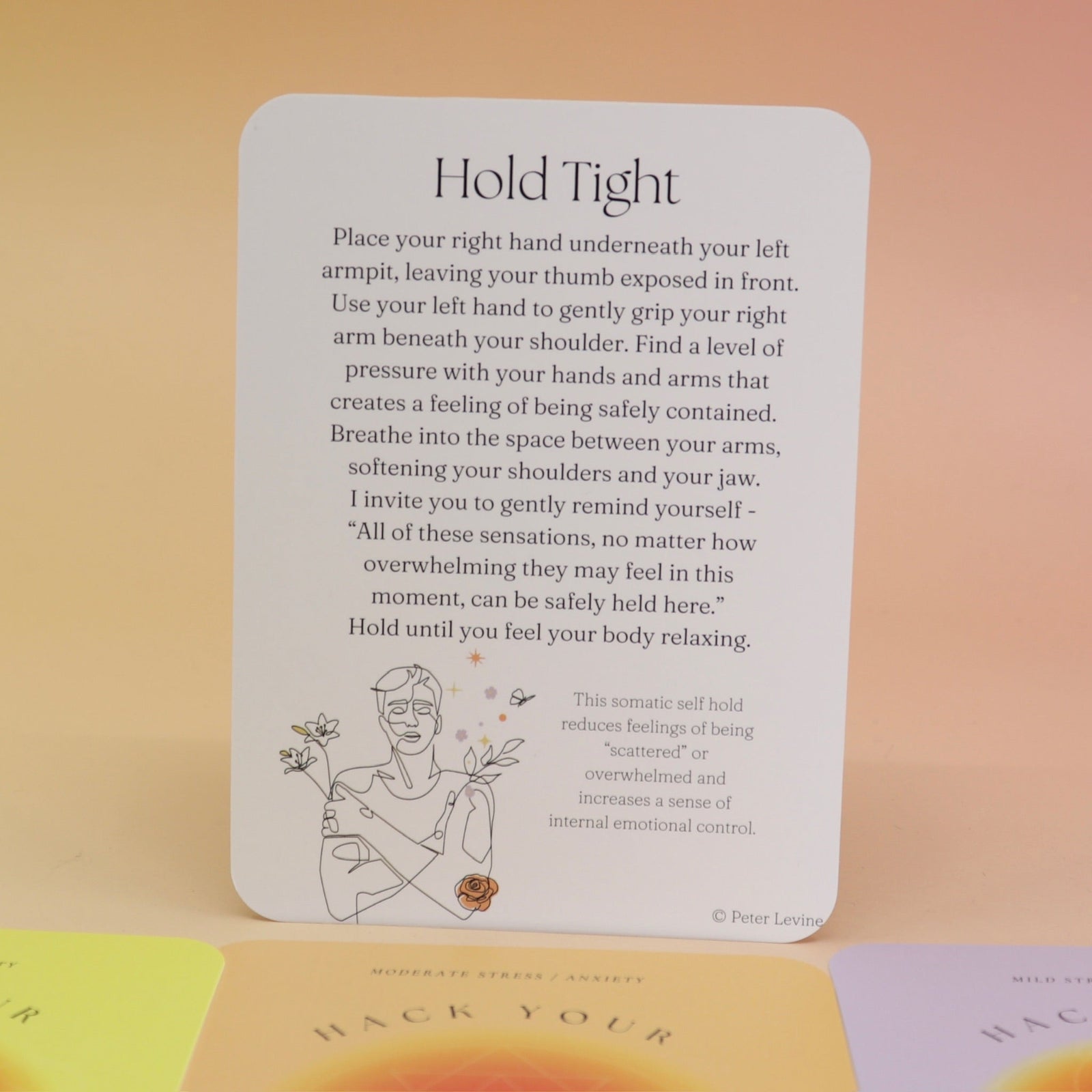 The contents of the Hack Your Nervous System card deck on a pink and yellow background.