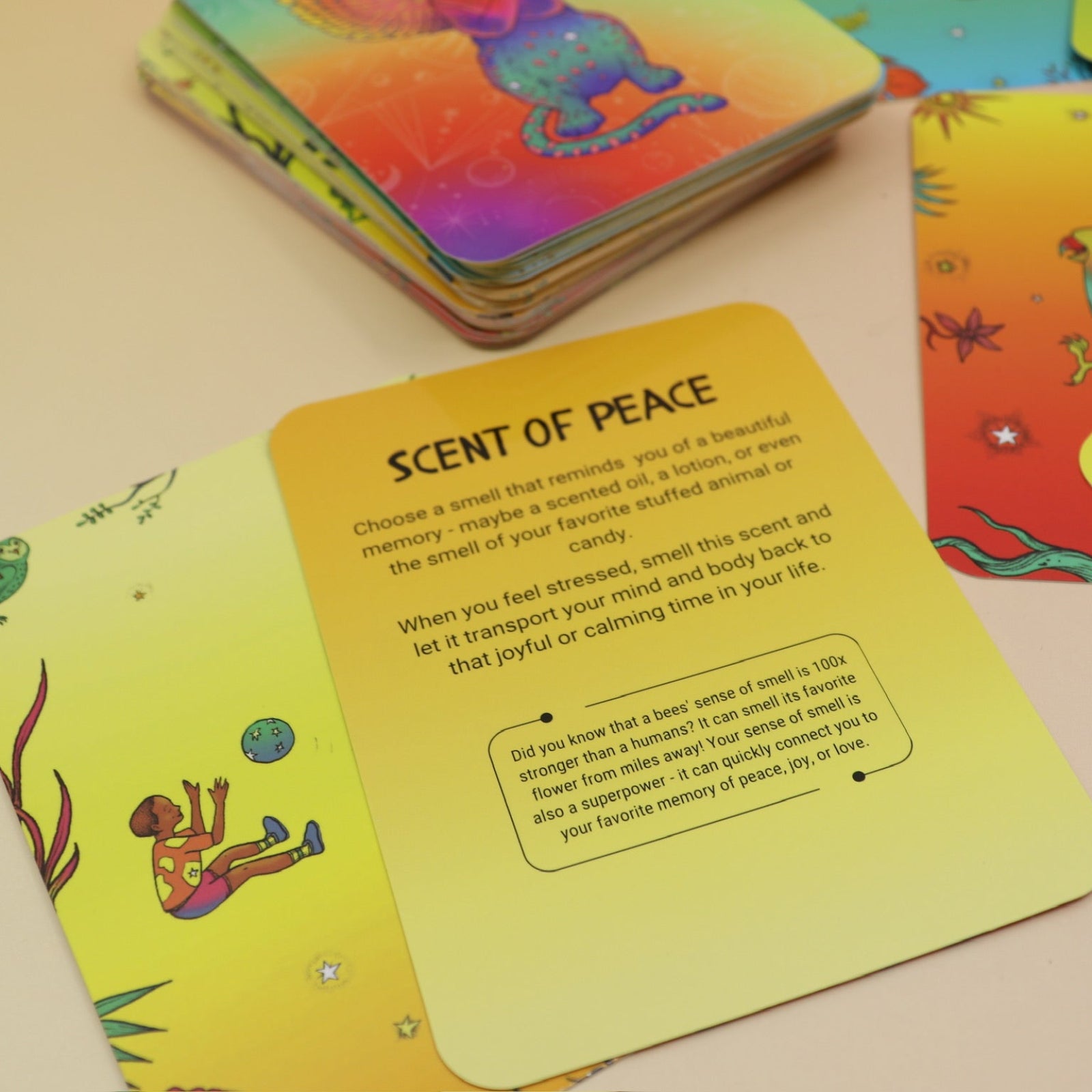 The contents of the Kingdom Calm Card Deck on a pink and yellow background.