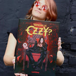 Person holding a 'Where is Ozzy?' album cover against a black brick wall.