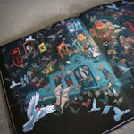 Open book with detailed illustrations of a fantasy scene featuring characters and architecture.