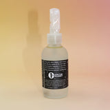 Clear bottle with a white cap on a gradient background