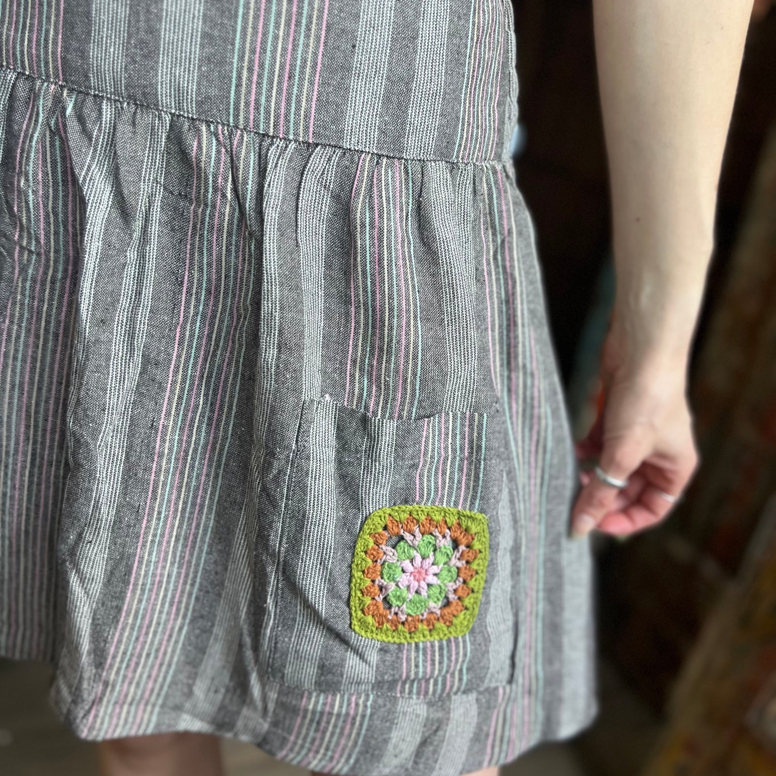 An up close image of the gray Granny Square Mini Skirt.