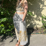 Someone wearing the gray Midnight Floral Midi Skirt.