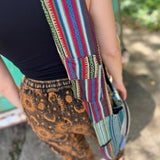 Someone wearing the Cotton Hemp Two Pocket Crossbody Bag.