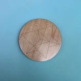 The 4 inch Merkabah Wooden Crystal Grid on a blue background.