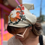 Someone wearing the Tomato Ivory Cotton Bandana.