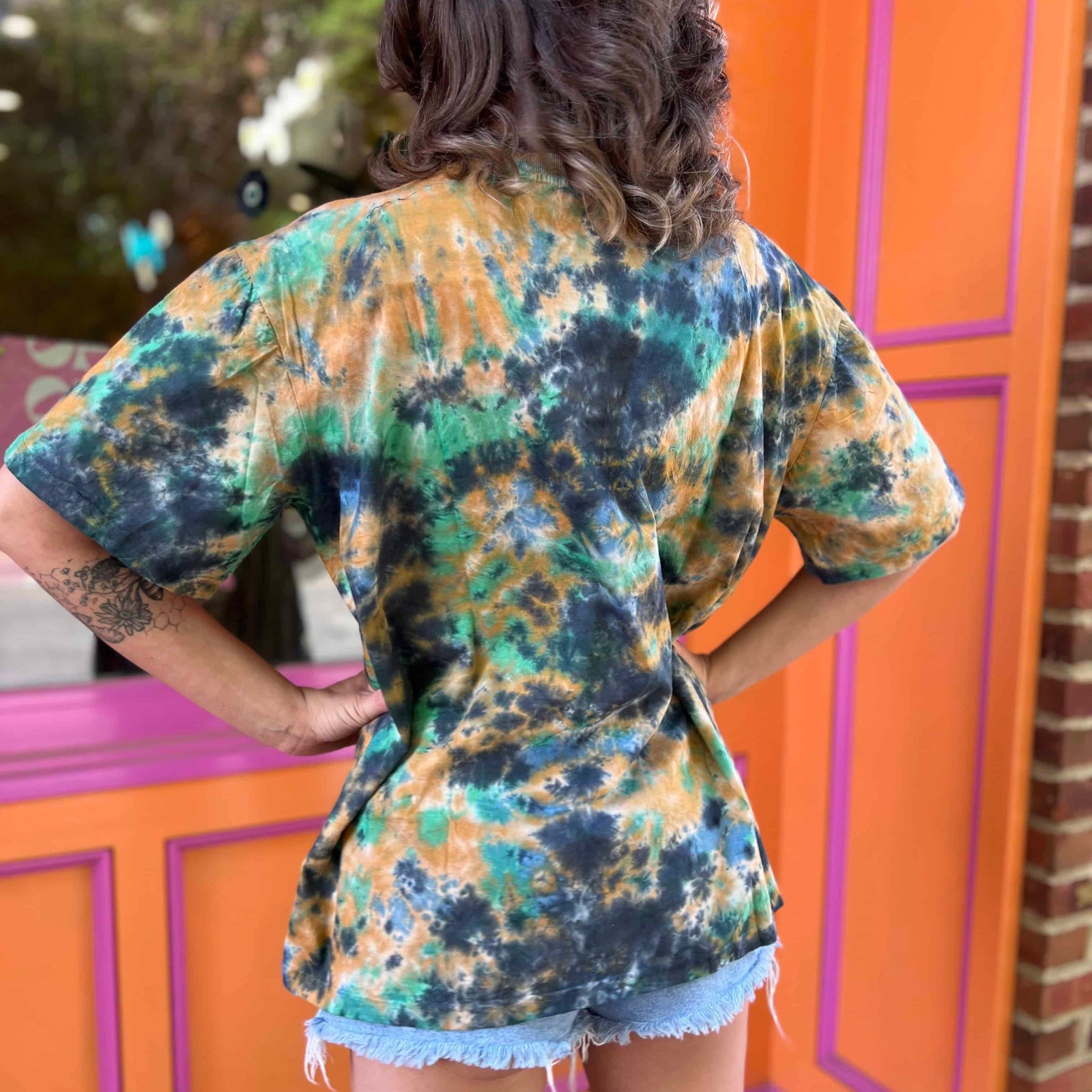 Back of model showing blue purple and yellow diamond tie-dye design