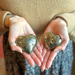 pyrite crystal hearts in palms