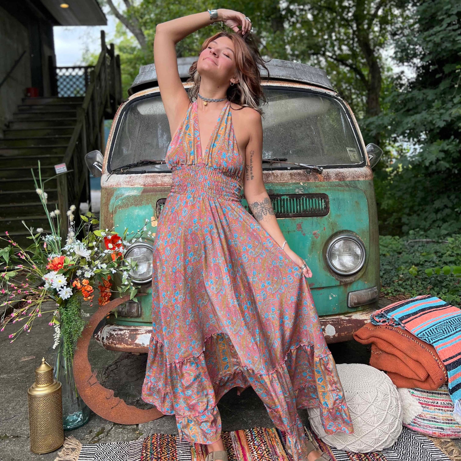 Boho goddess walking in silk maxi dress with bow tie