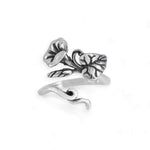 Silver floral design ring on a white background