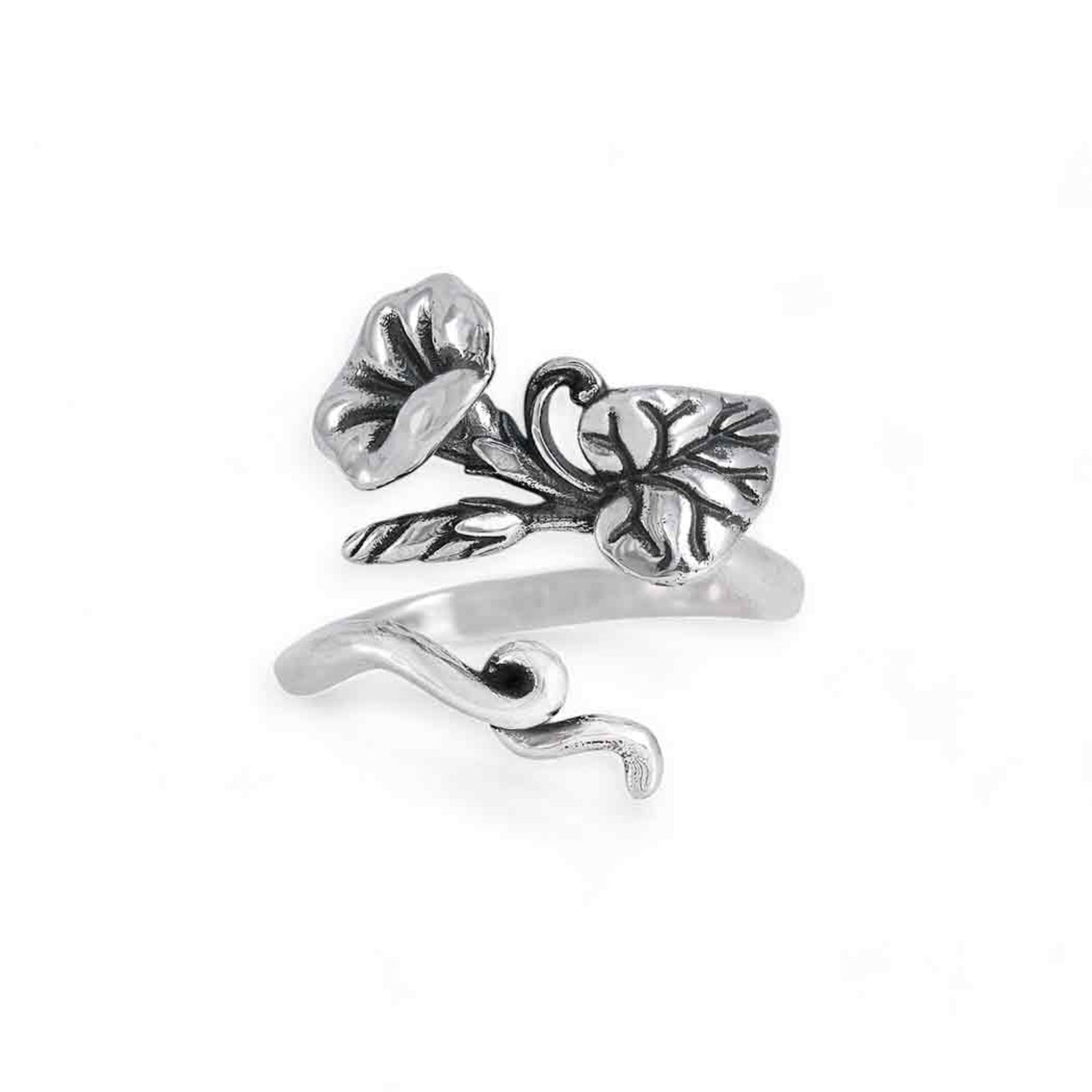 Silver floral design ring on a white background