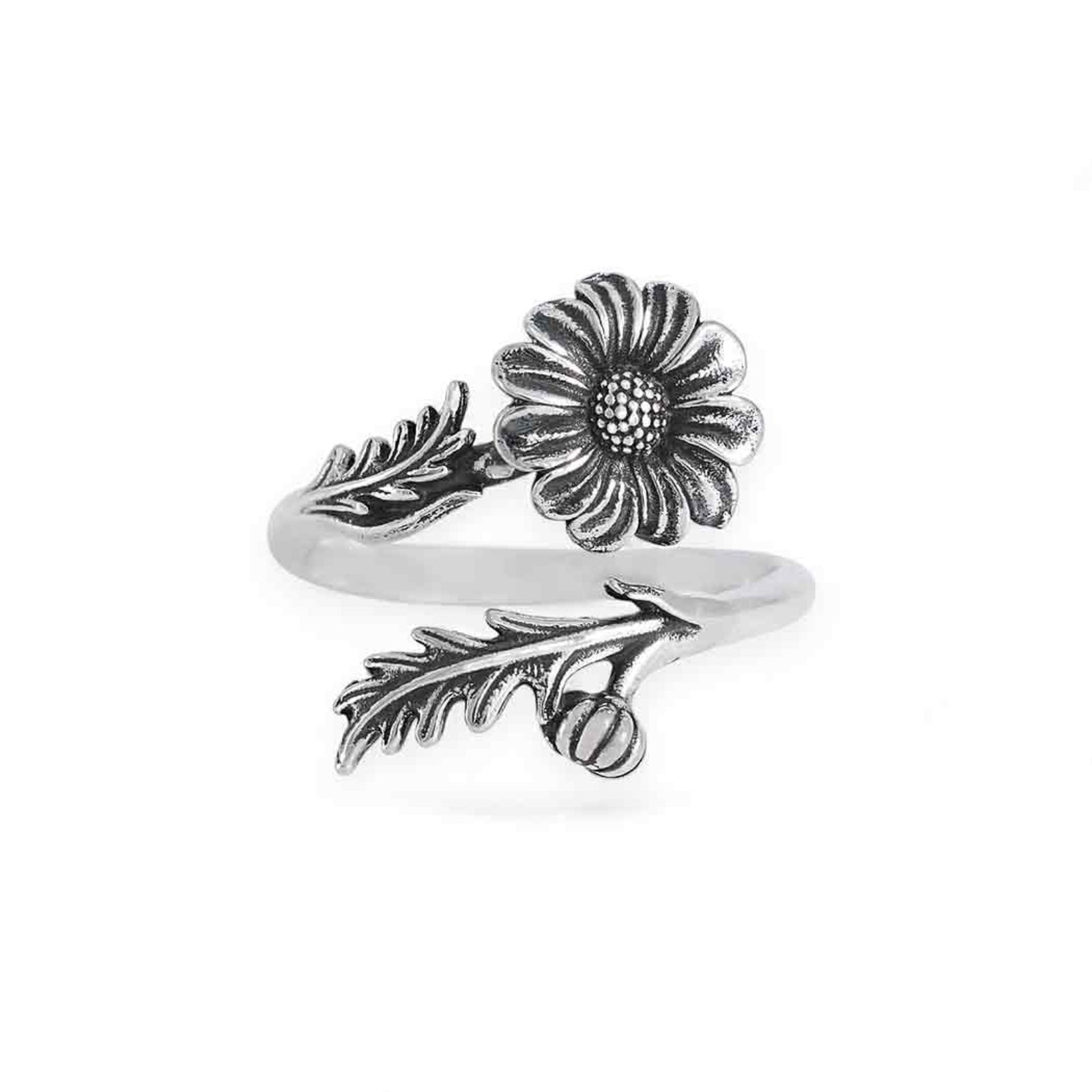 Silver ring with floral design on a white background