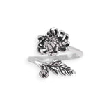 Silver floral ring on a white background