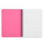 Open notebook with pink cover and white lined pages on a white background