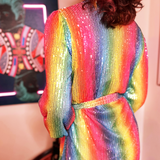 A woman wearing the Disco Rainbow Wrap Dress showing off the back.