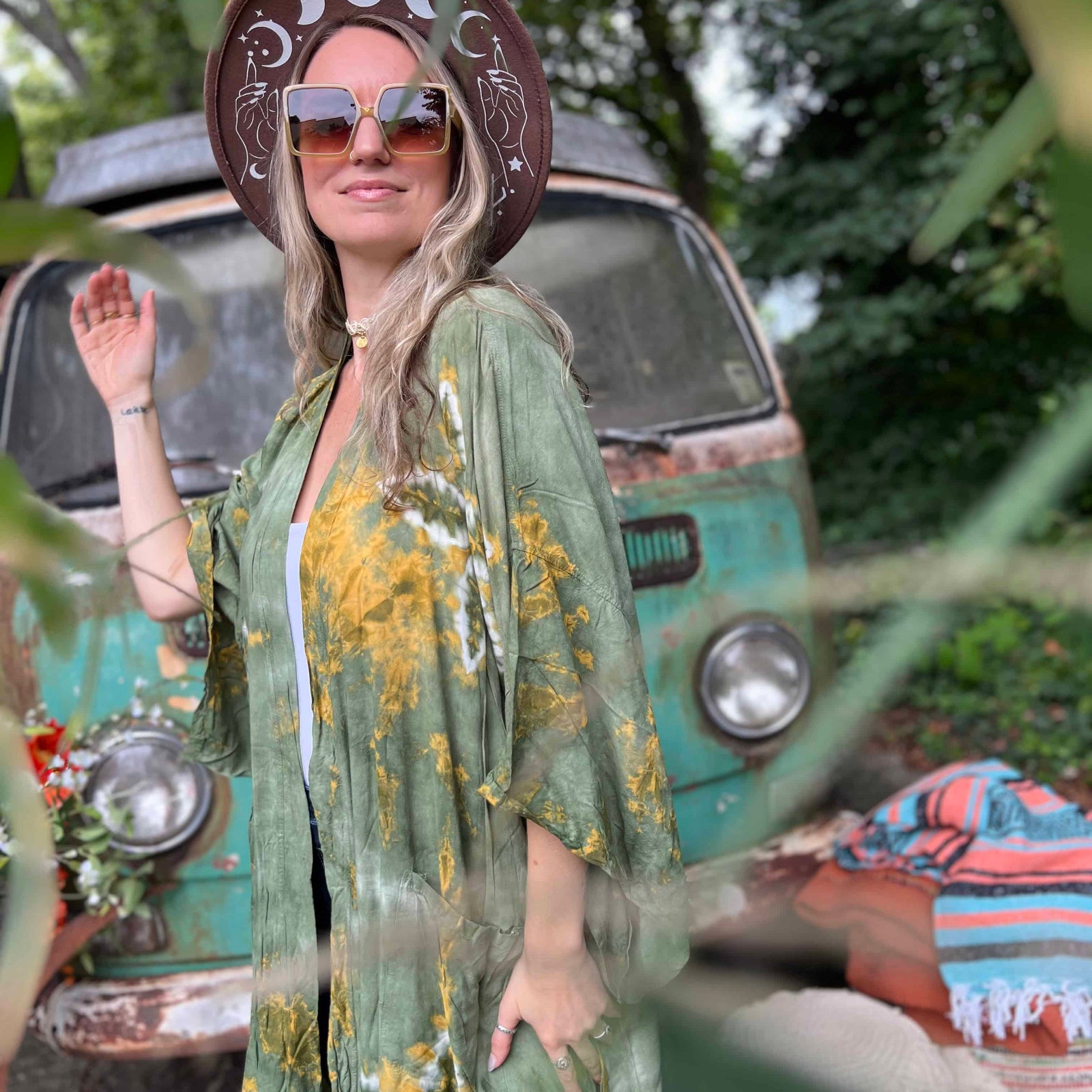 Front view of green bohemian hand-dyed kimono with lotus design