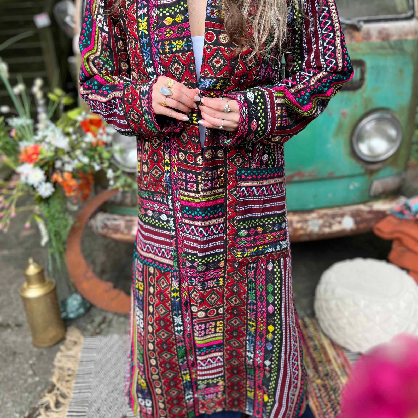 Close-up of handmade cotton unisex boho trench coat pockets