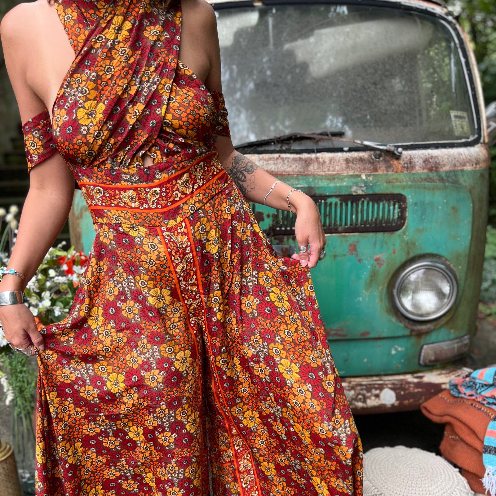 Psychedelic rainbow boho jumpsuit styled with flutter sleeves