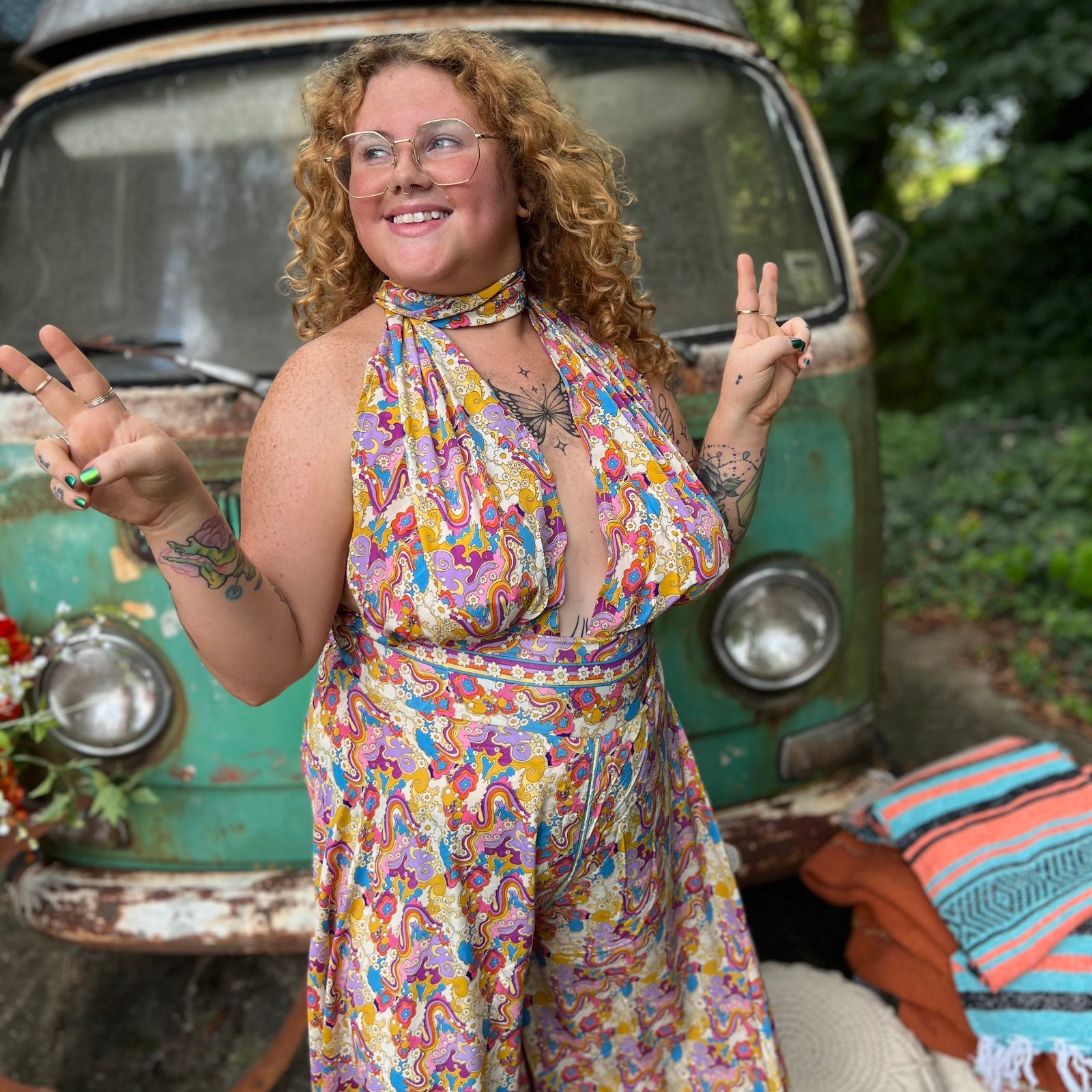 Rainbow jumpsuit with halter neck and open back design