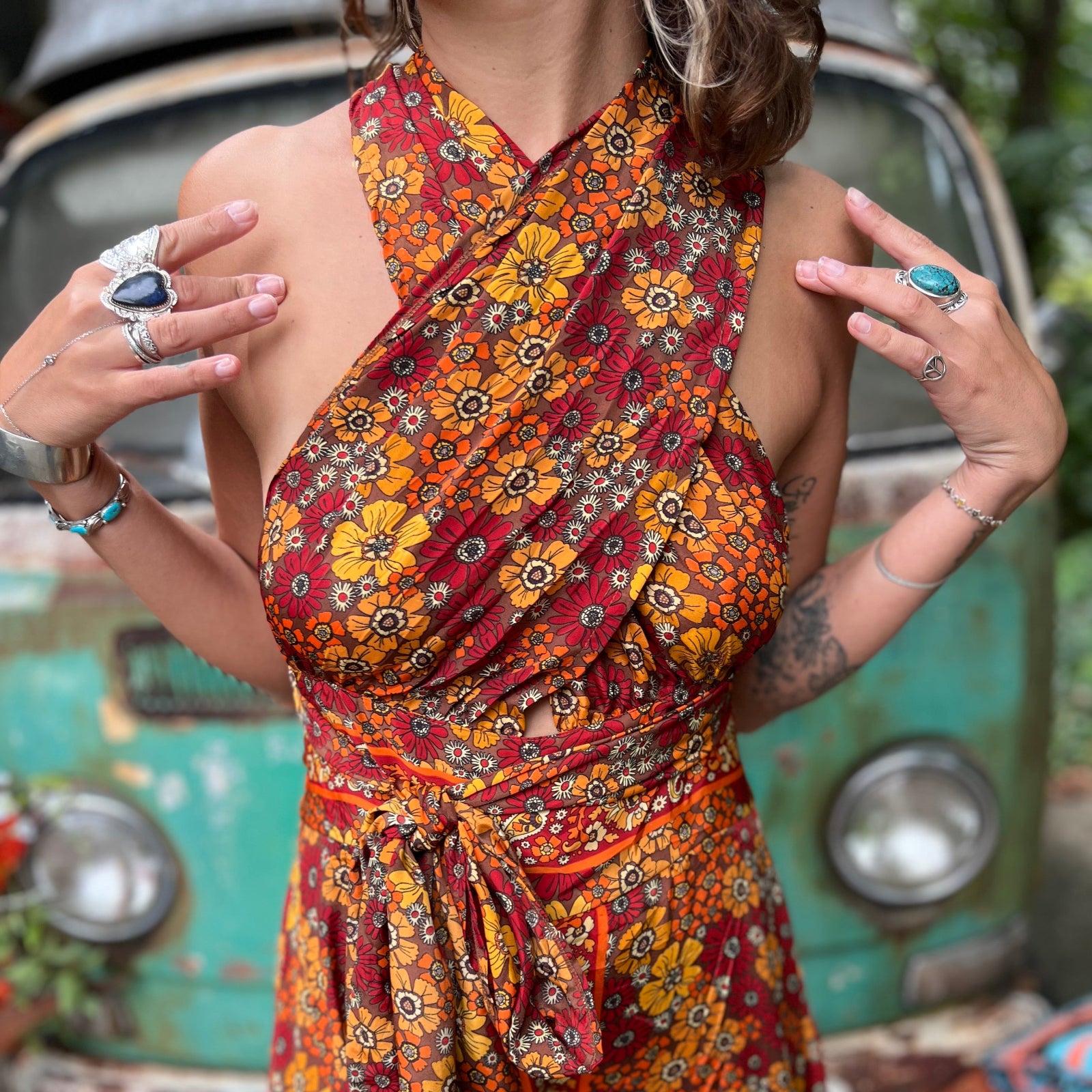 Colorful silk wide leg jumpsuit in motion, flowing fabric