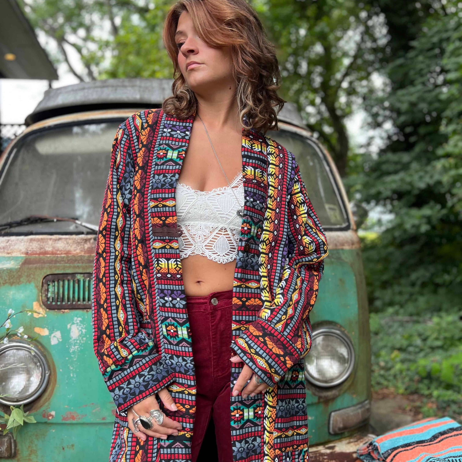 Unisex hippie style cotton trench coat worn on sidewalk