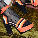 Peep toe Halloween heels with orange and yellow suede.