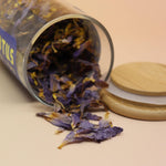Stylish packaging of Organic Blue Lotus Tea with modern blue and yellow design.