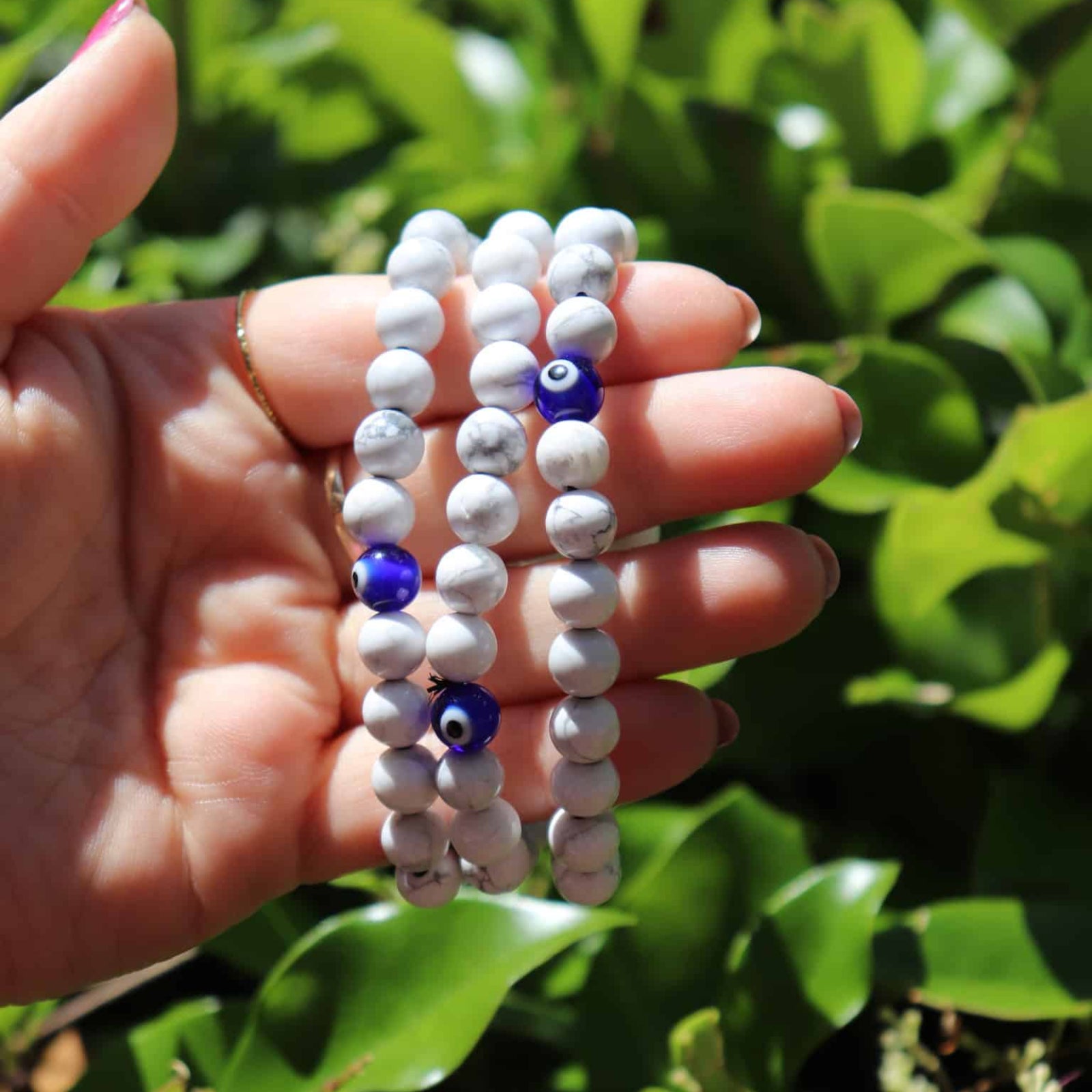 Close-up of Howlite crystal bracelet in sunlight