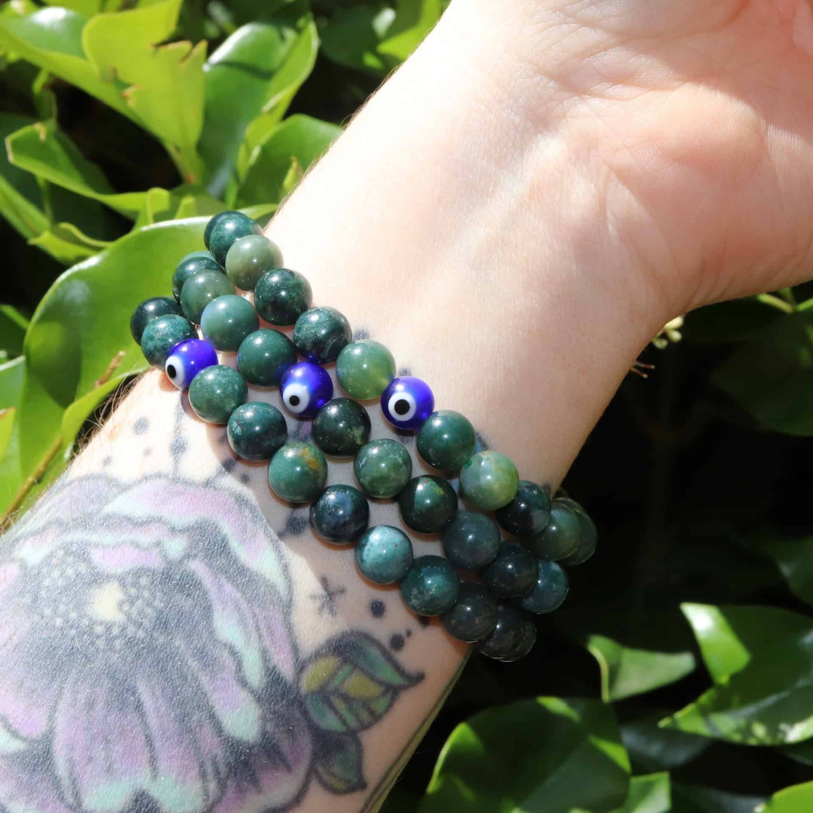 Moss Agate beaded bracelet with evil eye charms