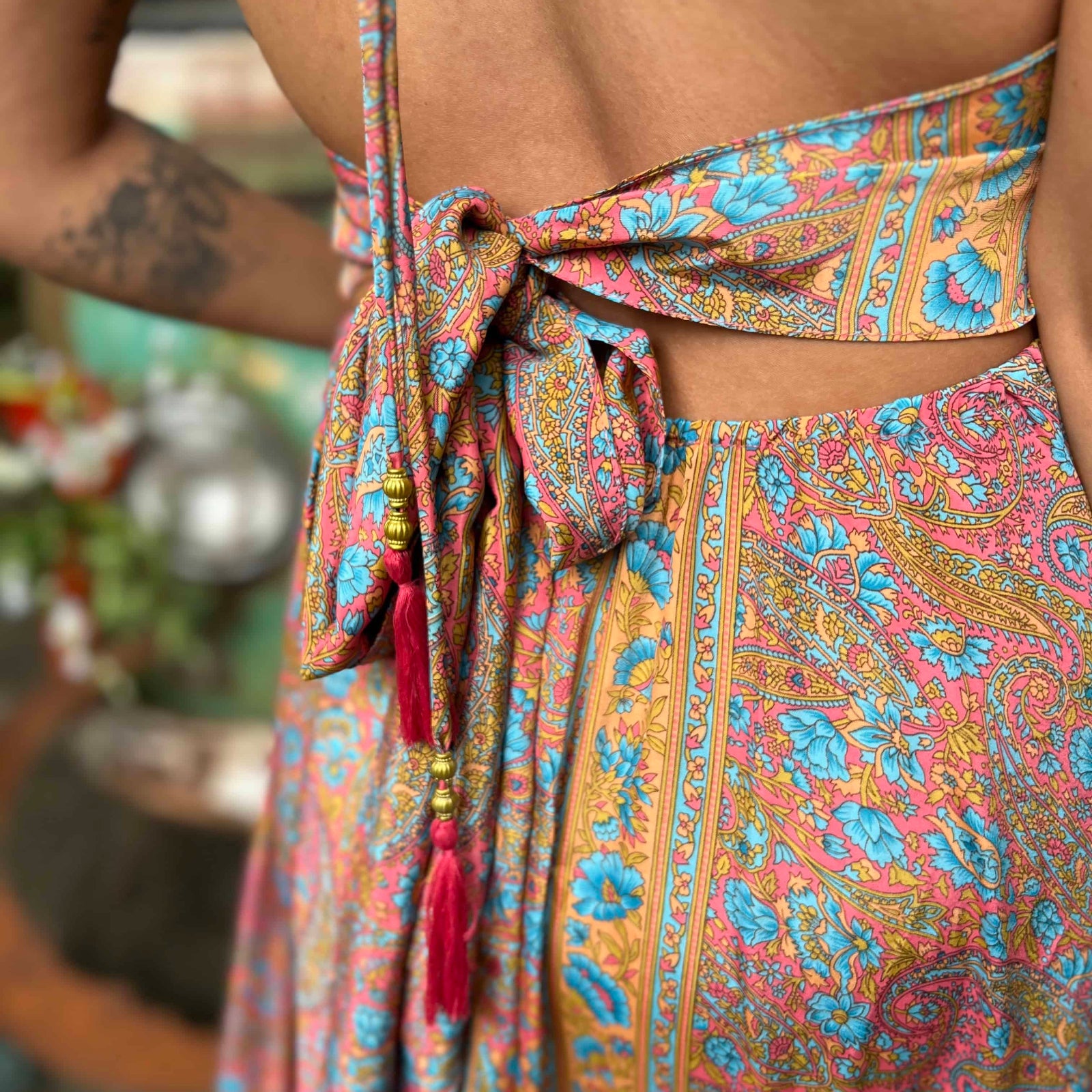 Back ribbon and bow detail on bohemian silk maxi dress