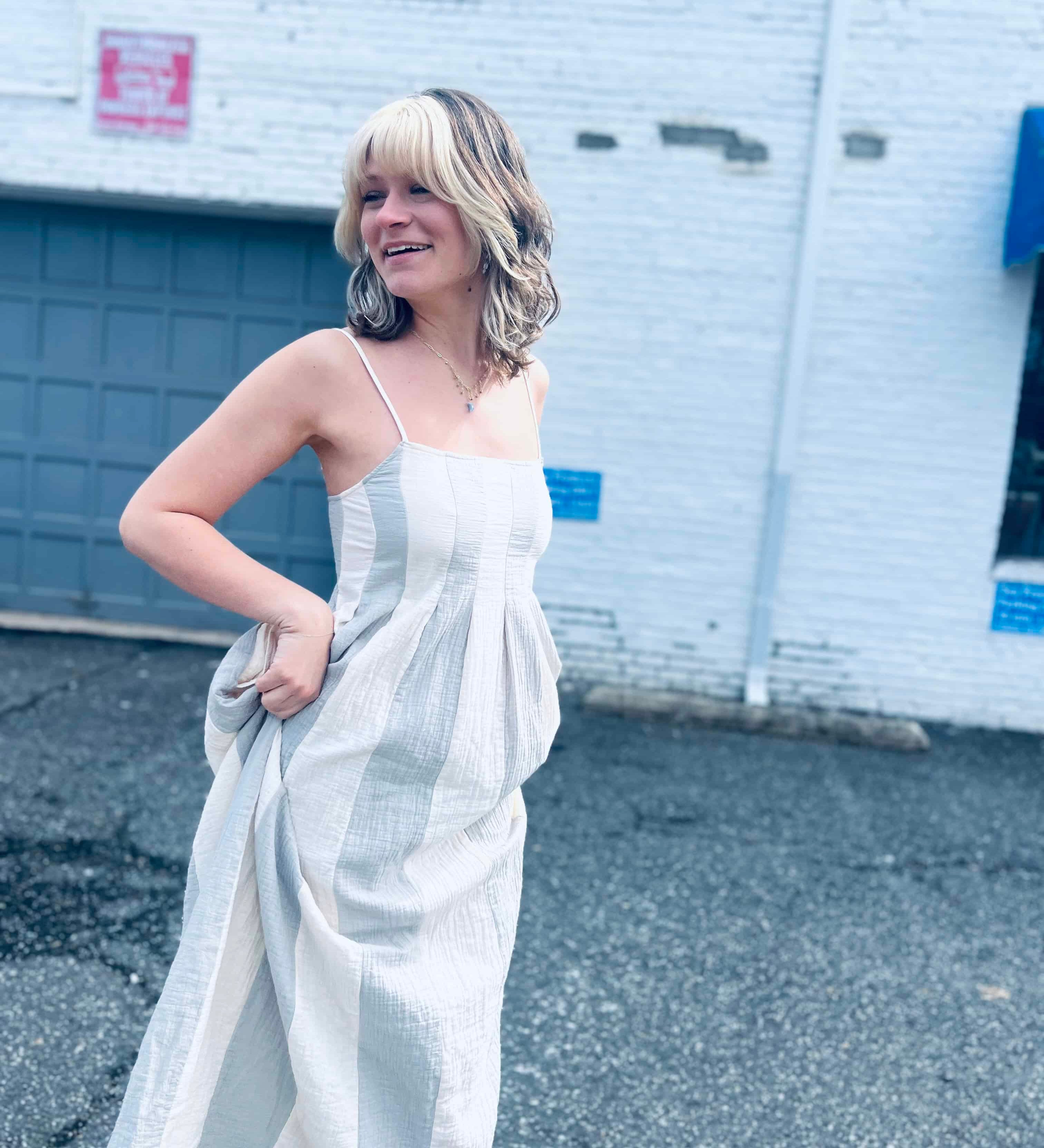 flowing cotton gauze midi dress captured in winston salem city backbround