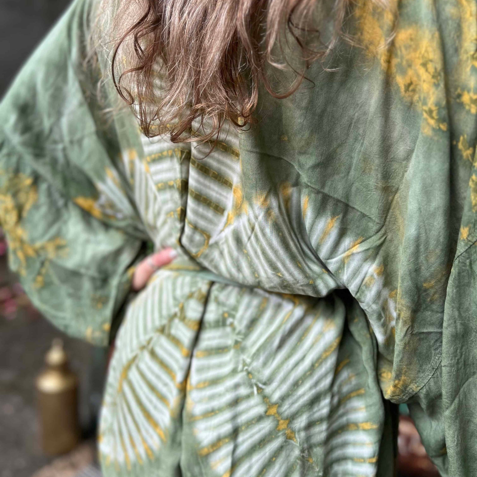 Full back view of green boho kimono with lotus tie dye design