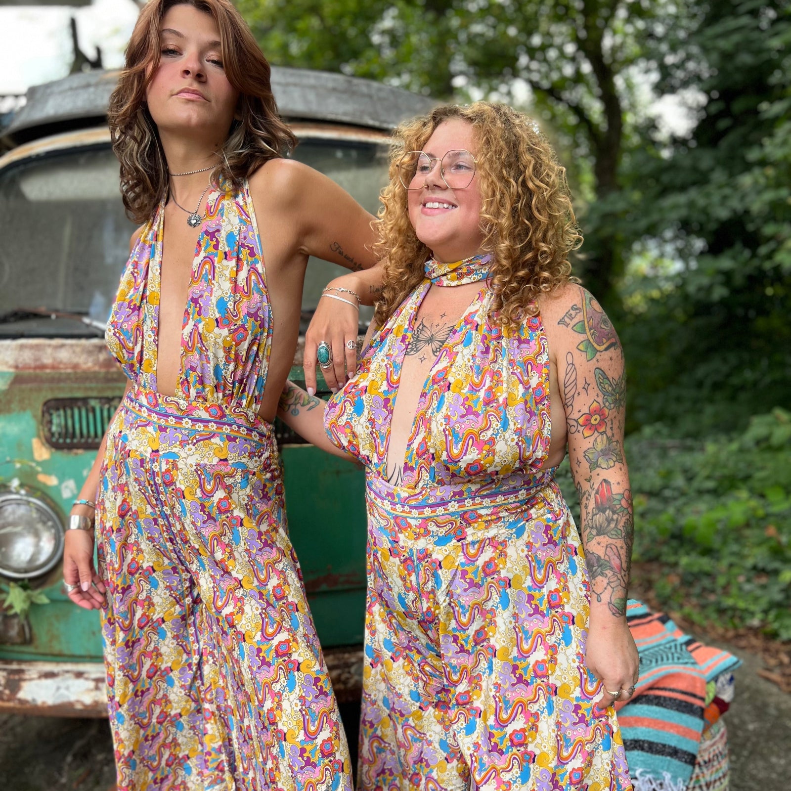 Group of women in rainbow boho jumpsuits, XXS to 5X