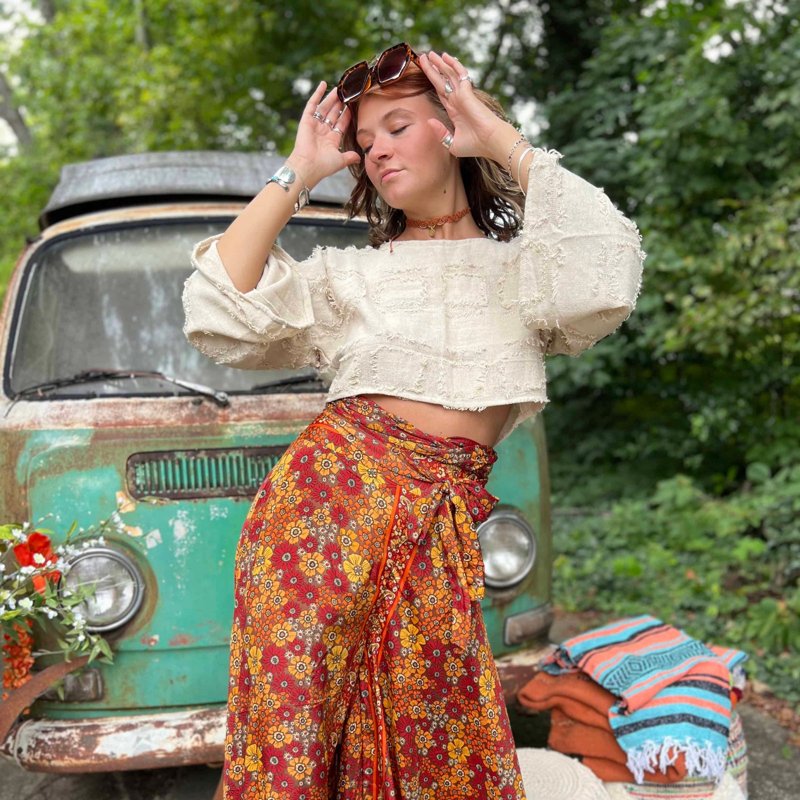 Model wearing grunge boho bell sleeve crop top front view