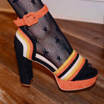 Vintage candy corn heels in retro striped suede design.