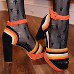 Bold striped Halloween pumps inspired by candy corn.