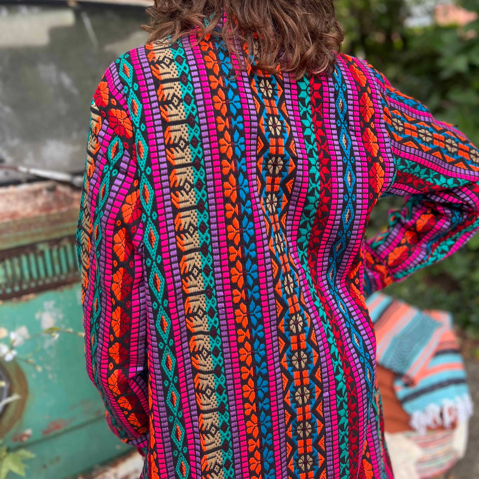 Oversized back view of unisex festival boho trench coat