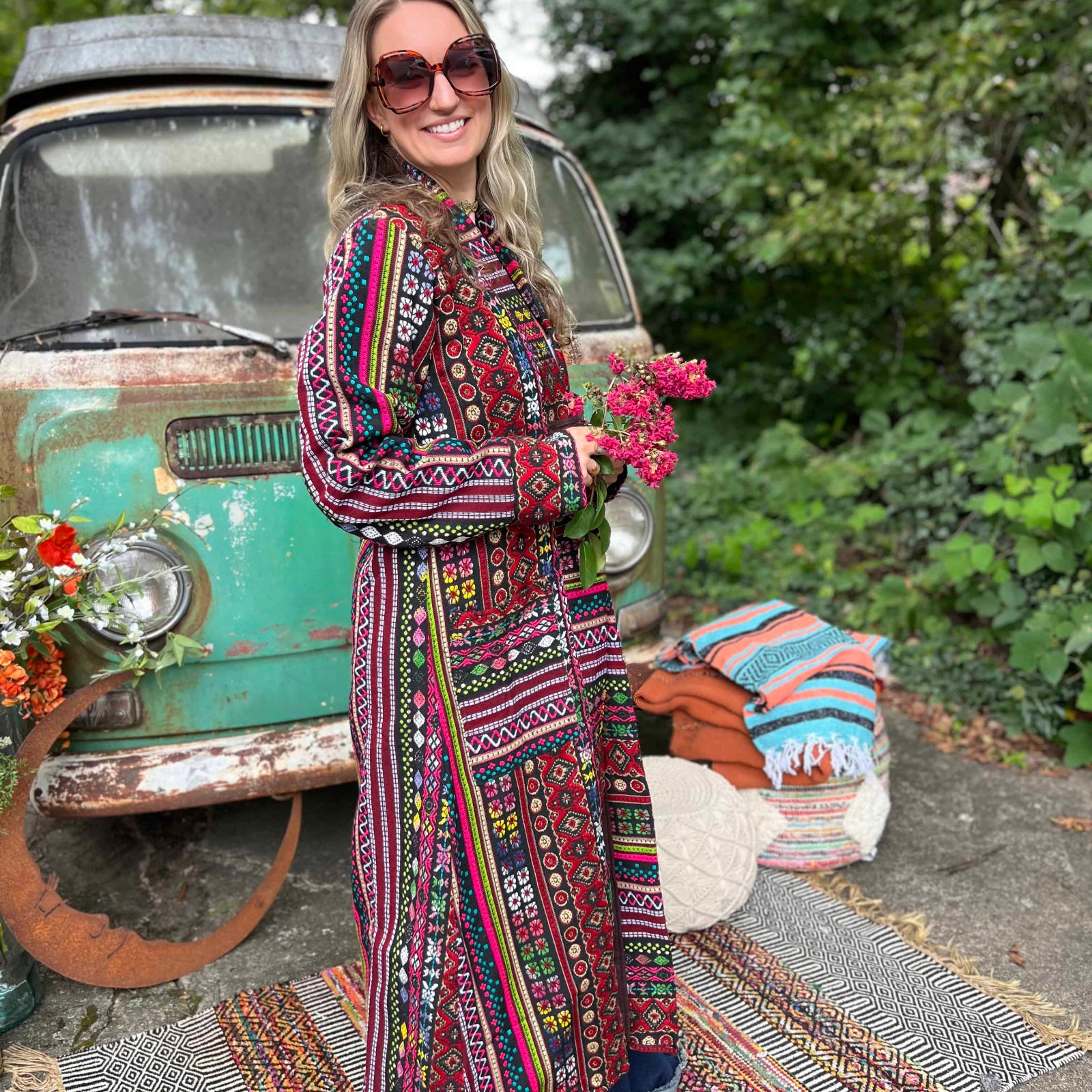 Full-body shot of festival unisex long boho trench jacket